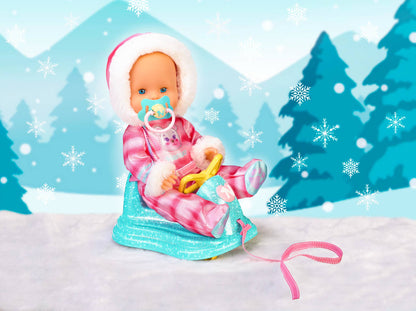 Nenuco 14" Baby Doll in Ski Suit and Sleigh Accesssory On Wheels With Color Chaning Nose, For Ages 2+